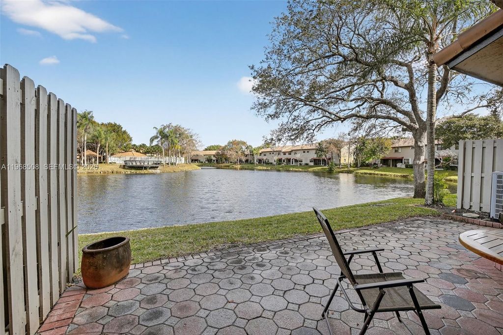 Photo of 9080 Vineyard Lake Dr, Plantation, FL 33324 (MLS # A11968508)