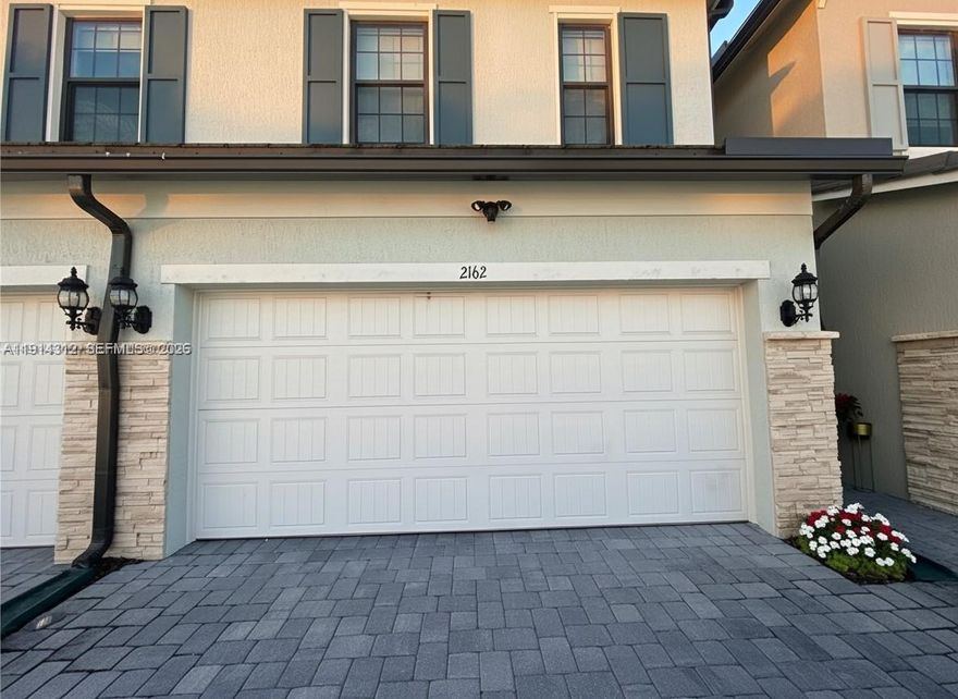 Great investment opportunity—this stunning 3-bedroom, 2.5-bath townhouse built in 2022 is located in the highly desirable Oak Tree community and is currently tenant-occupied. Enjoy serene lake views and modern upgrades including solar panels and a whole-house water filtration system. The home features a stylish kitchen with stainless steel appliances, smart home technology (Nest & Ring), impact windows and doors, and a two-car garage. HOA includes internet, adding value for tenants. Residents enjoy access to a resort-style clubhouse with fitness center, pool, pickleball courts, and more.