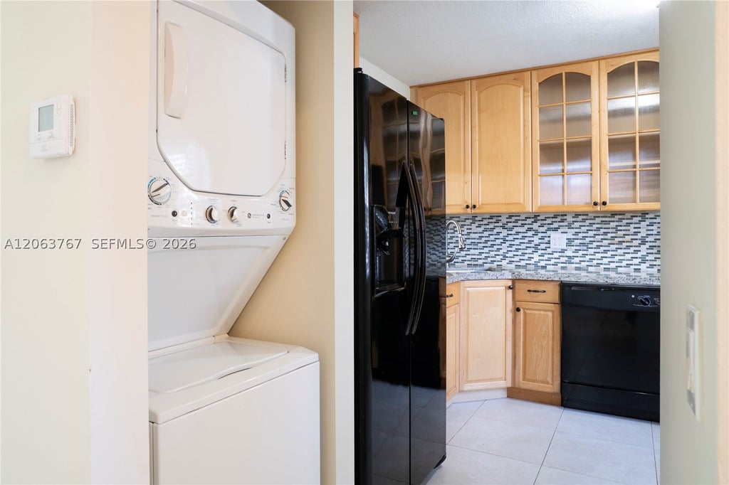 Photo of 1494 Springside Dr #1494, Weston, FL 33326 (MLS # A12063767)