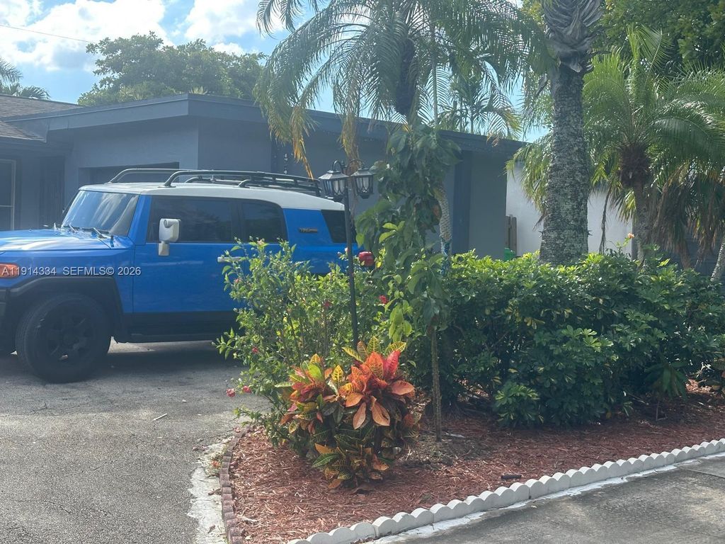 Photo of 9530 Sunset Strip, Sunrise, FL 33322 (MLS # A11914334)