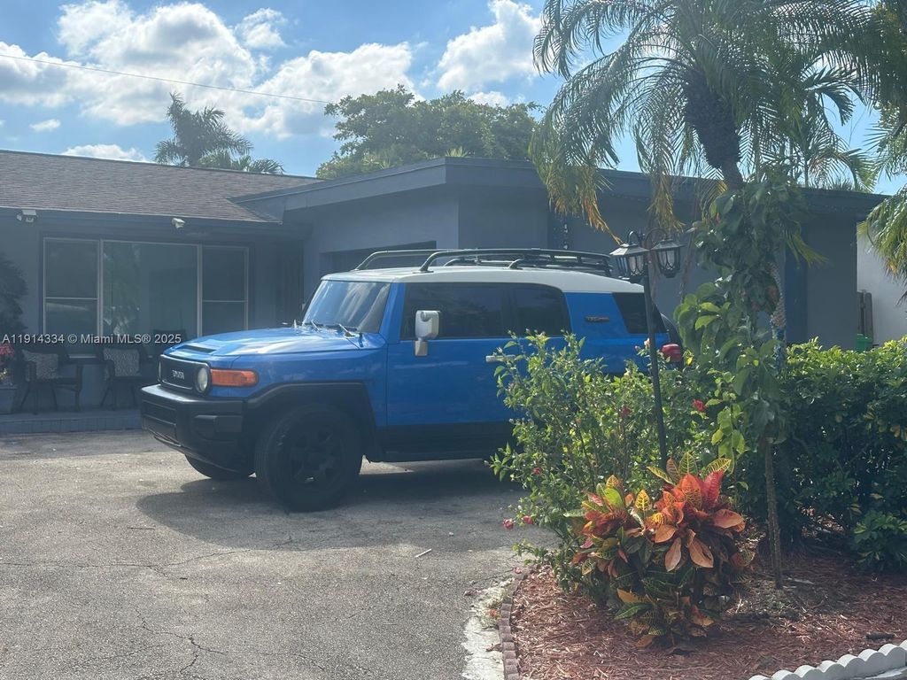 Photo of 9530 Sunset Strip, Sunrise, FL 33322 (MLS # A11914334)