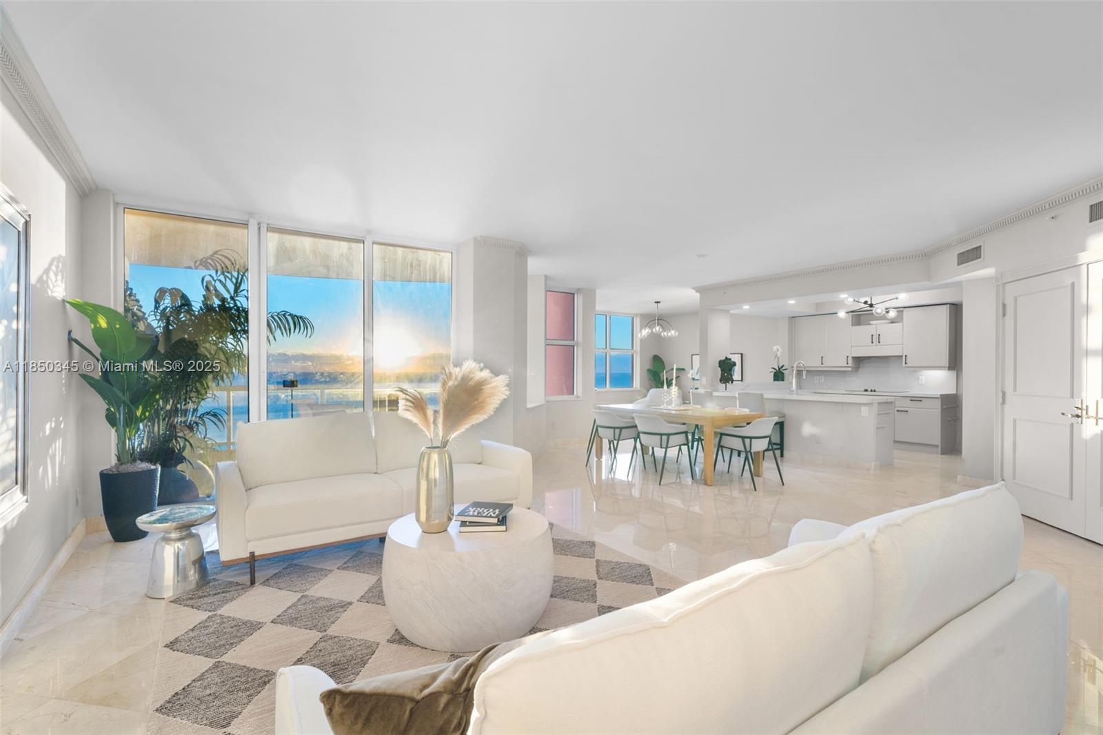 Experience the timeless allure of an Italian village where oceanfront charm meets unparalleled elegance. Enjoy a flow through floor plan with ocean and intracoastal/city views. The spectacular sunrises & sunsets of this resort style property is unmatched. Featuring a fully remodeled turnkey 2-bed+DEN, 2.5-bath retreat that seamlessly blends with east & west terraces, expansive living & media spaces, private elevator, and master suite with spa-like bath & steam room. Residents enjoy world-class amenities like oceanfront pool with pool/beach side service, private direct beach access, 2-story fitness center, tennis/racquetball courts, clubroom, conference room, 24hr valet & security within one of the city's most sought-after addresses. Exceptional opportunity for luxury living and lifestyle!