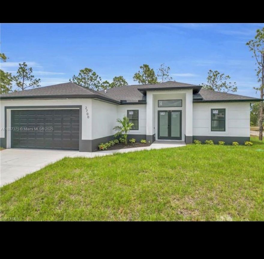 This beautiful New single-family home features 3 bedrooms, 2 bathrooms, a foyer, an open-concept layout, a 2-car garage, and a patio. white quartz countertops in the kitchen, and steel appliances, tile flooring throughout, adding an elegant and modern touch. Built with high-end finishes, it also includes impact-resistant windows and doors, a water filtration system, and a spacious garage for vehicles. Located in a no-HOA, family-oriented neighborhood, the home is just 25 minutes from Fort Myers and close to shopping, schools, and urban amenities in Lehigh Acres.