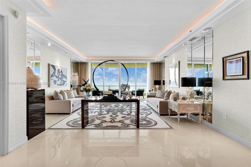 One of a kind beautiful flow through unit on 26th floor with direct ocean and intercoastal views - 3 bed + den + office , 4.5 bath and 3,500 SFT , 10 feet ceilings , fully furnished and finished with no expense spared . This professionally designed and decorated residence, private elevator foyer. 36x36 Italian marble floors throughout, complete closet systems, beautiful built-ins, snaidero kitchen, top-of-the-line appliances, sub-zero refrigerator, gas stove, cappuccino maker and more. Turnberry Ocean Colony is a gated community with prestigious service & resort style amenities that include valet parking, 2 heated pools, private spa, beach services, fitness center, club for the kids, hair salon, & 2 restaurants.