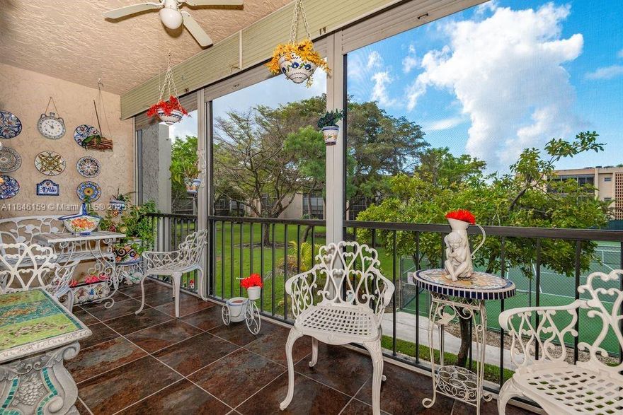 Call home, this fantastic corner unit at Kendall Acres West Condo. The unit is located on the second floor boasting 1235 square feet..... It's huge! Gorgeously renovated kitchen perfect to suit the budding gourmet chef in you, with one-of-a-kind granite stone, stainless steel appliances, wood cabinets, large floor to ceiling pantry and plenty of natural light. Both bathrooms have been tastefully remodeled. Walk-in closet in main bedroom. Porcelain floors throughout the unit give uniformity to the very spacious layout of this condo. Laundry room with full size washer and dryer, plus additional storage. Screened balcony overlooking the tennis courts and pool. Storm shutters. Do not miss the opportunity to own this fabulous unit. ***No rentals on first year of ownership***