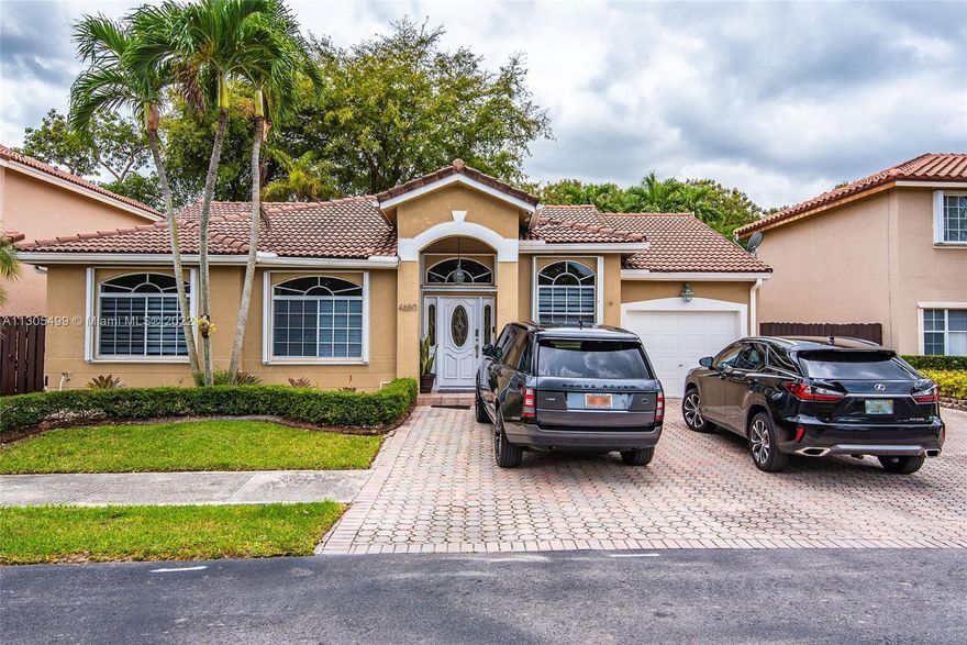 Motivated Seller and Priced to Sell! This Spacious 4/2, with wooden tall kitchen cabinets and granite counters, stainless steel appliances, and a breakfast area. Tiles throughout and laminate floors in the bedrooms. Pavers in the huge front driveway and backyard, with an emergency generator. Great community, No Violations. This is an ALF (Adult Living Facility) in Lakes of the Meadow with lots of upgrades. The sale is only for the house and does not include the ALF. The buyer will have to respect the long-term lease agreement with the ALF.