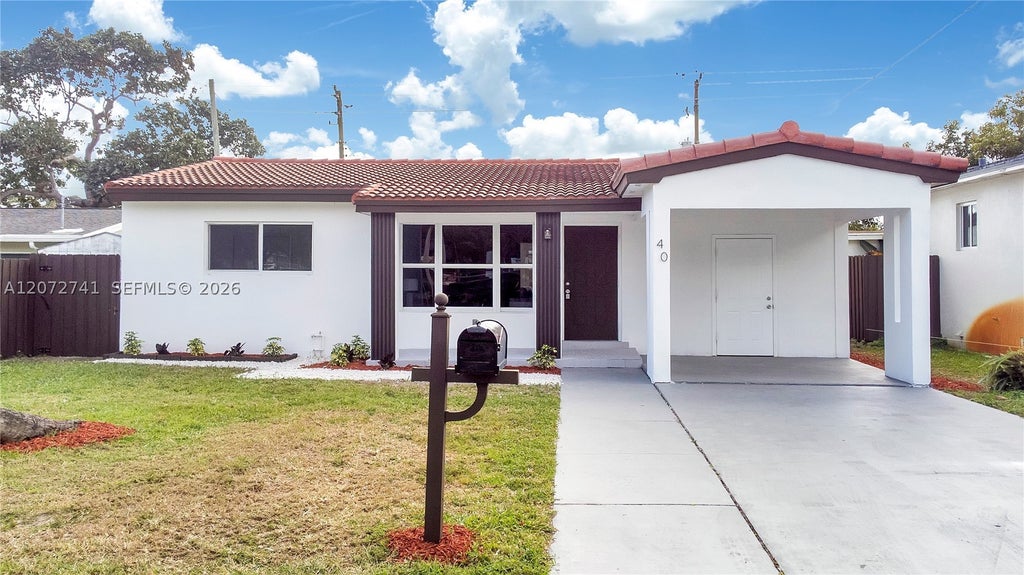 Photo of 40 SE 3rd Terrace, Dania Beach, FL 33004 (MLS # A12072741)