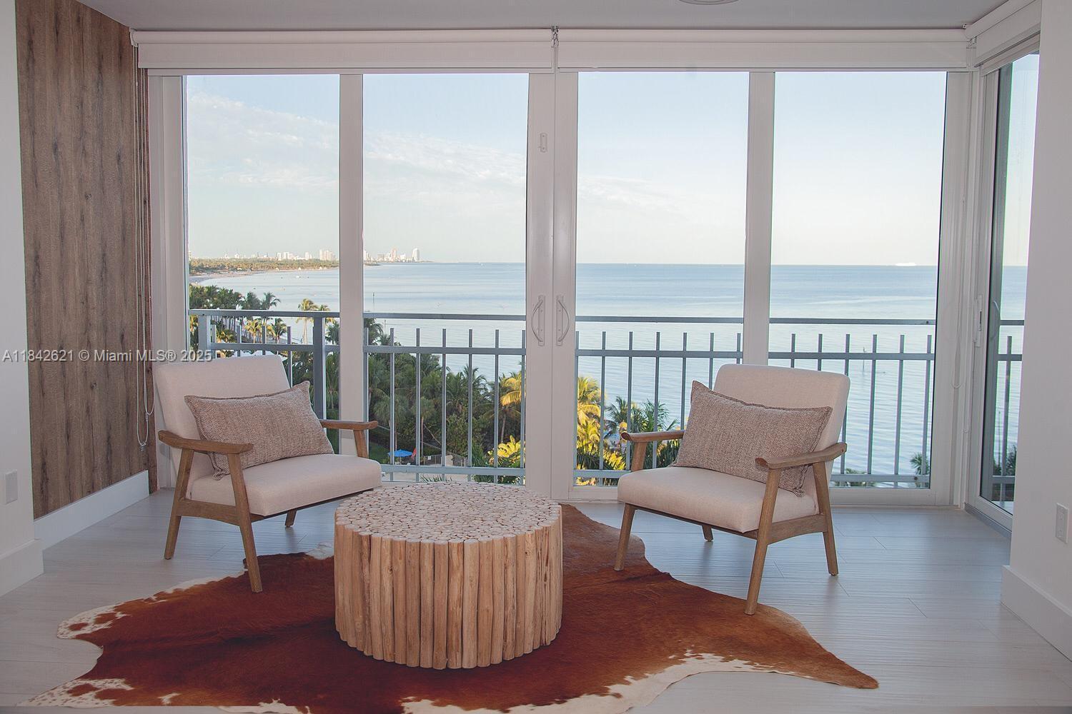 Direct ocean view! Enjoy waterfront living in this beautifully remodeled three-bedroom, three-bathroom apartment. The home features elegant tile flooring throughout, a custom-designed kitchen with top-of-the-line appliances, and modern bath cabinets. Enjoy peace of mind with impact windows and doors, a separate laundry area, and spacious bathrooms with ample closet space. The large eat-in kitchen and oversized terrace make this home perfect for entertaining guests in style. The building offers resort-style amenities, including private beach access, pool, BBQ, gym and a penthouse party room with panoramic ocean views.