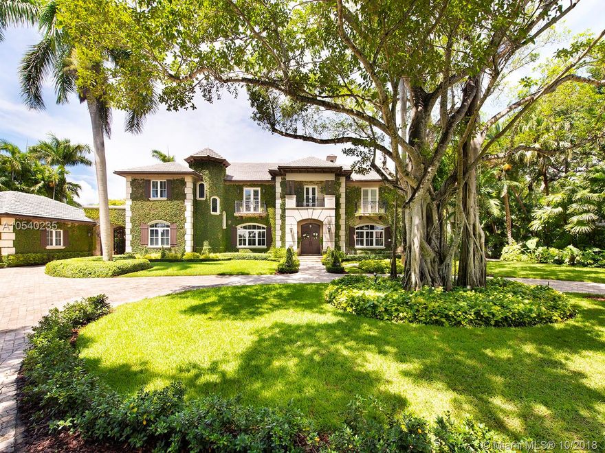 Chateau Grande. This 6 bedroom estate sits at the end of a canopied cul-de-sac off School House Road in the heart of Ponce Davis. Ivy drapes the French inspired facade.  The interior features soaring ceiling and meticulous finishes.  The resort like grounds create an unparalled family retreat! Whole house generator, mosquito control system, swim up pool bar and gazebo. This home has it all. Welcome Home!!