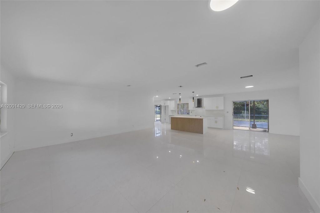 Photo of 1320 NW 72nd Ave, Plantation, FL 33313 (MLS # A12001429)