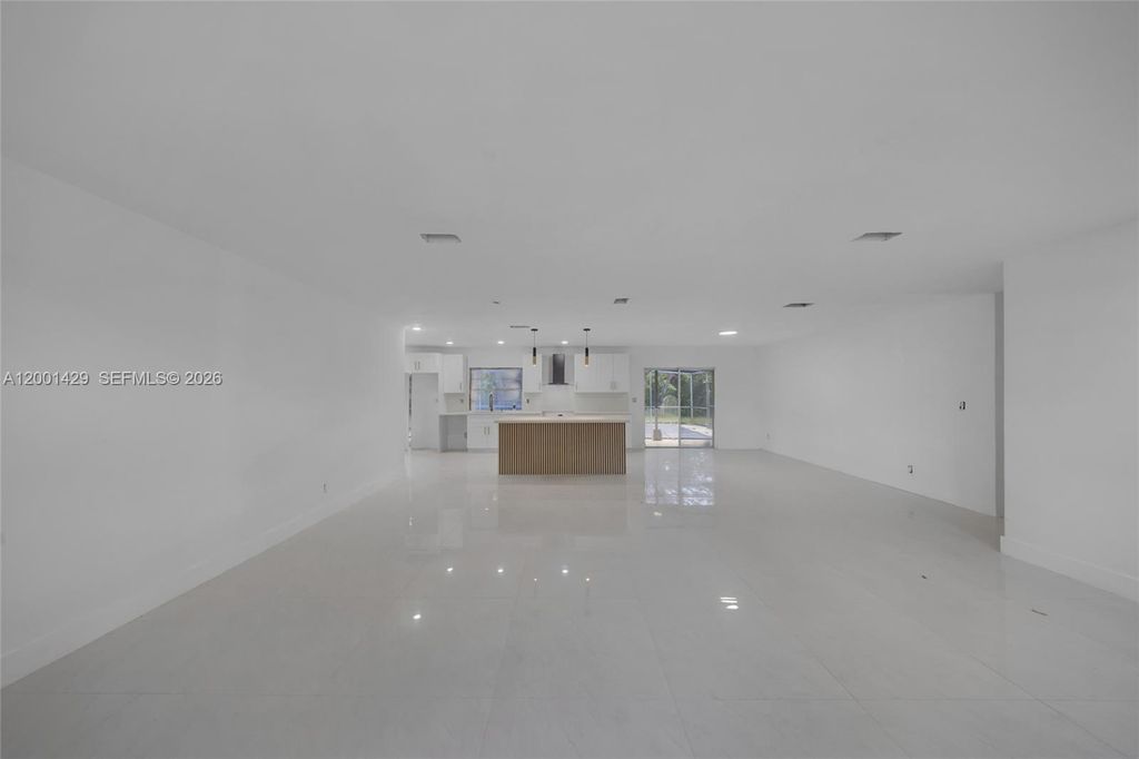 Photo of 1320 NW 72nd Ave, Plantation, FL 33313 (MLS # A12001429)