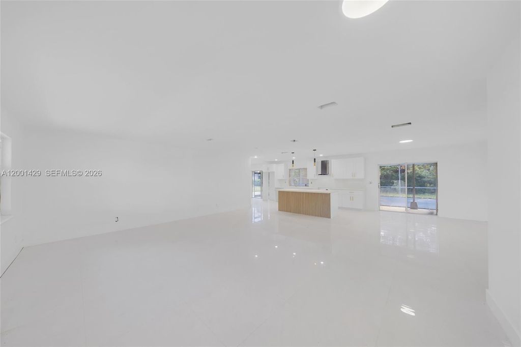 Photo of 1320 NW 72nd Ave, Plantation, FL 33313 (MLS # A12001429)