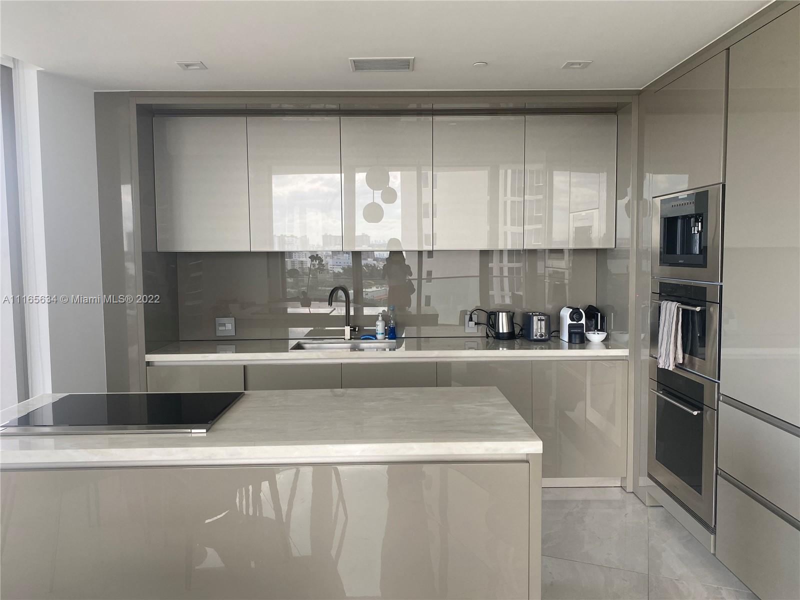 18975 COLLINS CONDO - Residential Lease