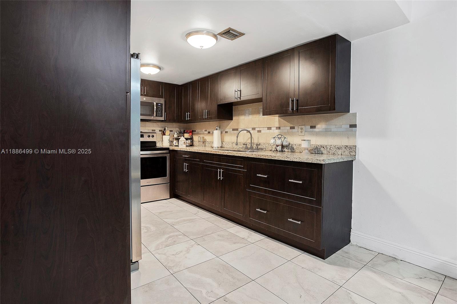 PALM-EAST GARDENS CONDO - Residential
