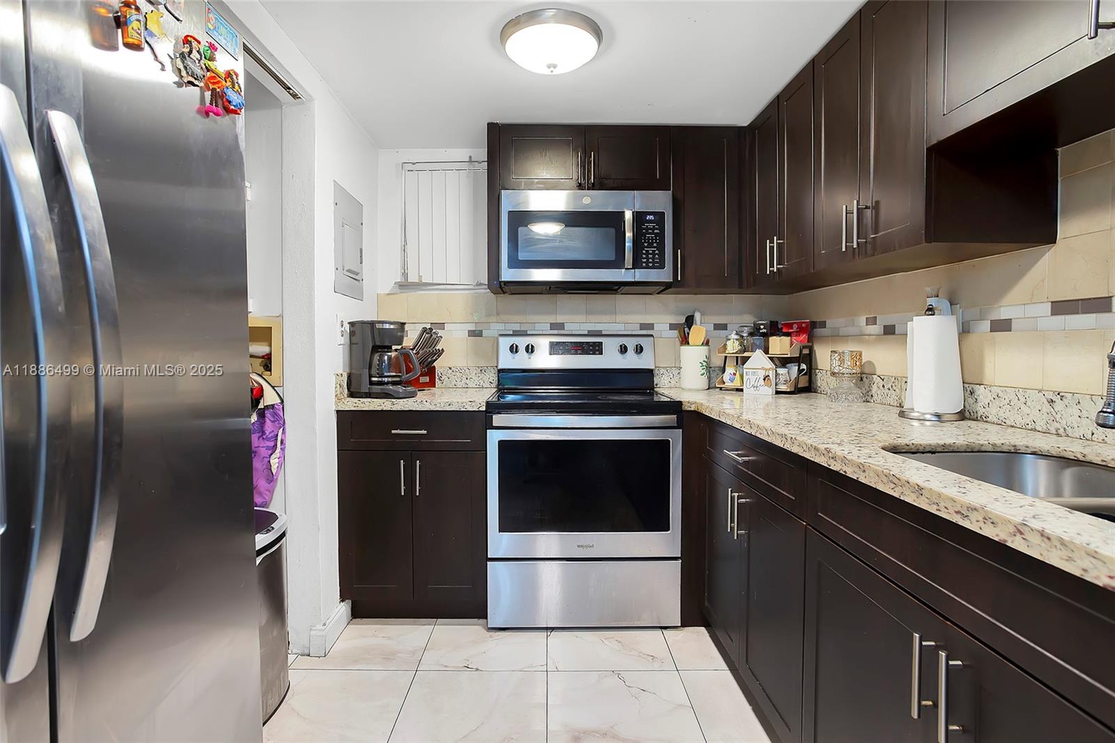 PALM-EAST GARDENS CONDO - Residential