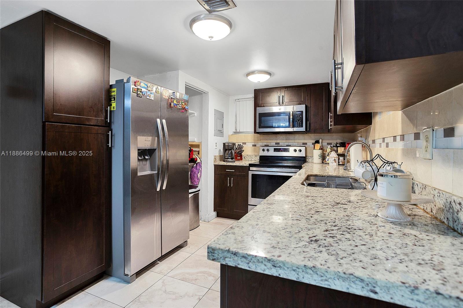 PALM-EAST GARDENS CONDO - Residential