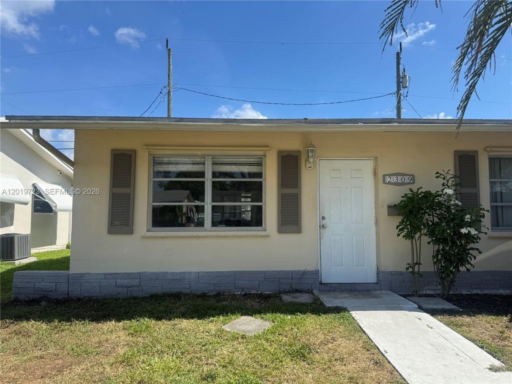 Photo of 2309 NW 54th St, Tamarac, FL 33309 (MLS # A12019723)
