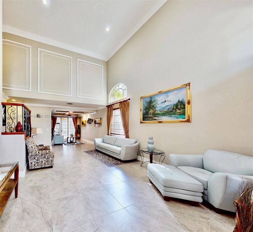 Photo of 5469 NW 106th Dr, Coral Springs, FL 33076 (MLS # A11614810)