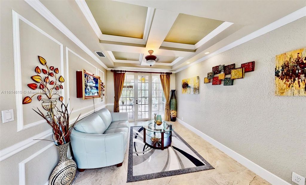 Photo of 5469 NW 106th Dr, Coral Springs, FL 33076 (MLS # A11614810)