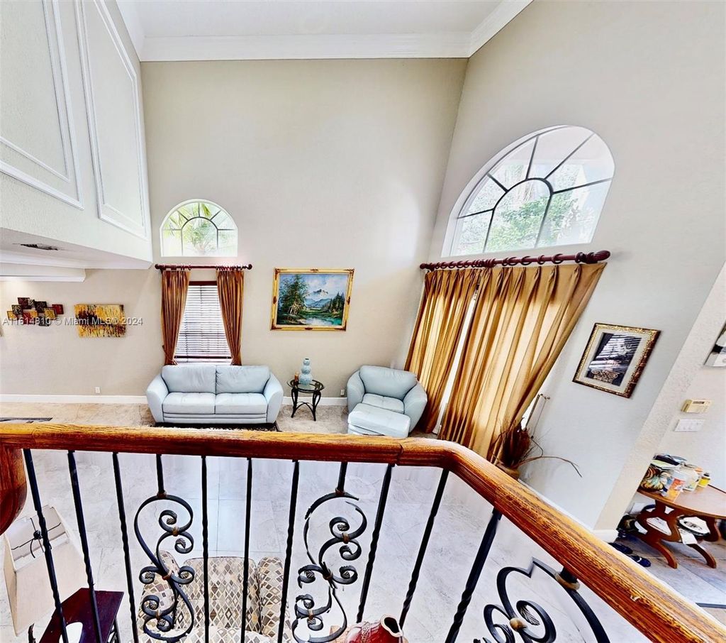 Photo of 5469 NW 106th Dr, Coral Springs, FL 33076 (MLS # A11614810)