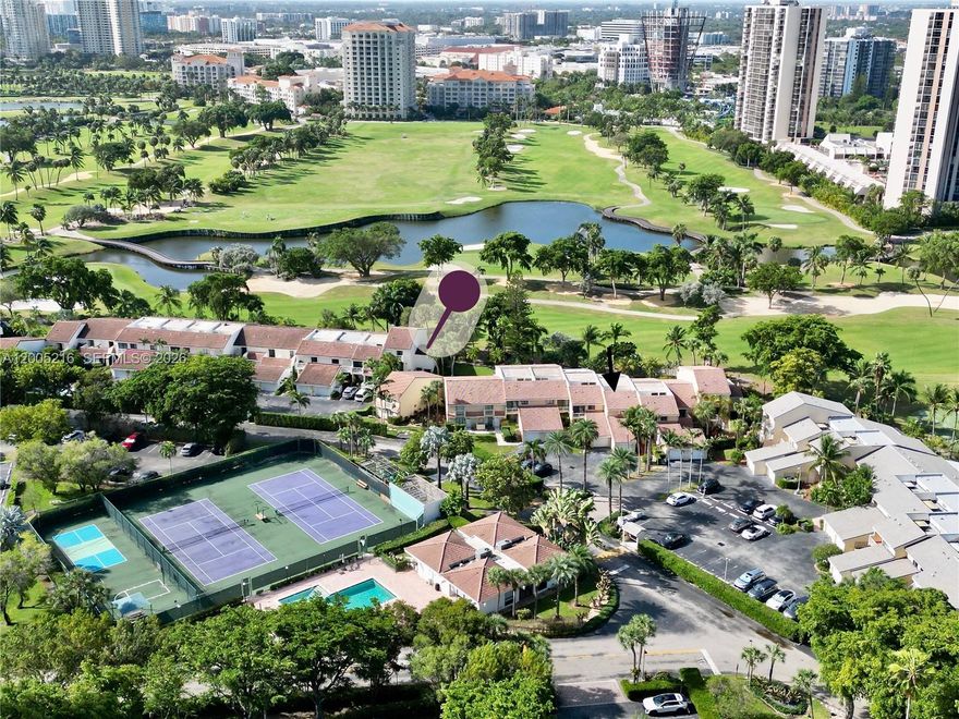 Beautiful Corner Villa overlooking Turnberry Golf Course! Discover this 1-bedroom corner unit in the heart of Aventura, surrounded by lush greenery and serene golf course views. Enjoy the privacy of your own front entry with patio and a rear covered patio, perfect for relaxing or entertaining. Inside, you will find a modern white kitchen with a cozy breakfast area that can also serve as a home office, nursery or sitting room. This charming home features a washer and dryer in the home for your convenience. The community offers 24-hour gated security and just steps away you'll find a heated pool, tennis courts, and fitness center. Walk to Aventura Mall, restaurants and scenic walking paths. Resort-style living at its best! PET FRIENDLY