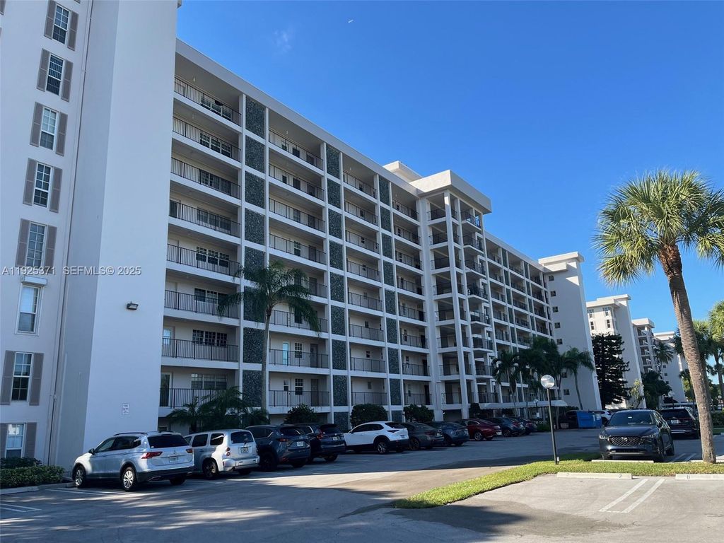 Photo of 3100 N Palm Aire Dr #104, Pompano Beach, FL 33069 (MLS # A11925371)
