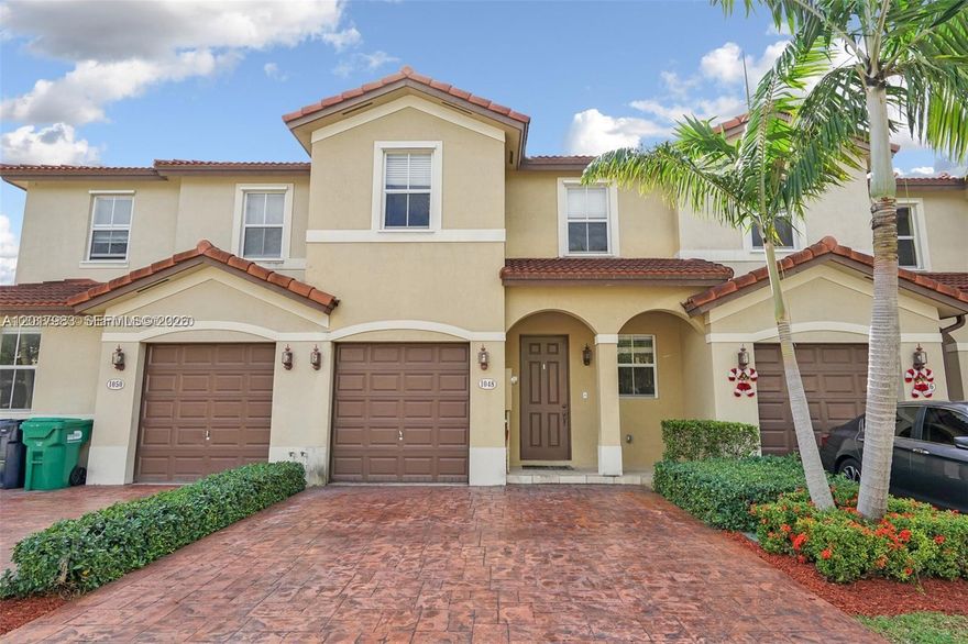 Beautiful and spacious 3-bedroom, 2.5-bath townhome located in the highly desirable gated community of Ives Dairy Townhomes, just minutes from Aventura. This is the largest 3-bedroom model in the community and features an open and functional layout with abundant natural light, a loft area ideal for office or flex space, and a private fenced patio perfect for entertaining.

The modern eat-in kitchen offers stainless steel appliances and ample cabinet space. Oversized primary suite features a walk-in closet and spacious bathroom with dual sinks, Roman tub, and separate shower. Additional highlights include a 1-car garage with automatic door, full-size washer/dryer, extra storage, and 2 parking spaces directly in front of the unit.

Well-maintained gated community with 24-hour security and community pool. Excellent location near Aventura Mall, Brightline, I-95, shopping, dining, and top schools. Great opportunity for both end users and investors.