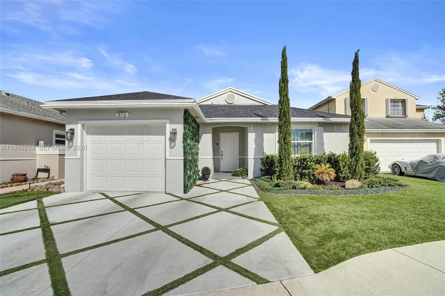 Beautifully remodeled single-family home featuring 3 bedrooms plus a versatile additional room that can easily serve as a 4th bedroom, home office, or guest space, along with 2 updated bathrooms. This home offers a bright and open layout with high ceilings in the family and dining areas, creating a spacious and inviting atmosphere.

Tastefully upgraded throughout with modern flooring, a fully renovated kitchen, and stylishly updated bathrooms. The home has undergone significant improvements, enhancing both comfort and functionality.

The outdoor spaces have been thoughtfully designed with elegant artificial turf landscaping, creating a low-maintenance yet visually appealing environment. Enjoy a charming and private backyard, complete with decorative greenery panels and a convenient storage shed, perfect for relaxing or entertaining.

This property features a covered one-car garage with automatic door plus driveway space for up to 2 additional vehicles, providing excellent parking flexibility.

Located in a desirable community offering amenities including a pool, jacuzzi, and playground, and ideally positioned directly across from Oscar Wind Park and the scenic Sawgrass Sanctuary, perfect for walking, exercising, and enjoying nature.

Prime location just minutes from major highways (I-595, I-75, Sawgrass Expressway) and world-class shopping at Sawgrass Mills Mall, as well as dining and top-rated Weston schools.