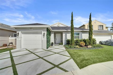 Photo of 372 W Riverbend Dr, Sunrise, FL 33326 (MLS # A11993233)