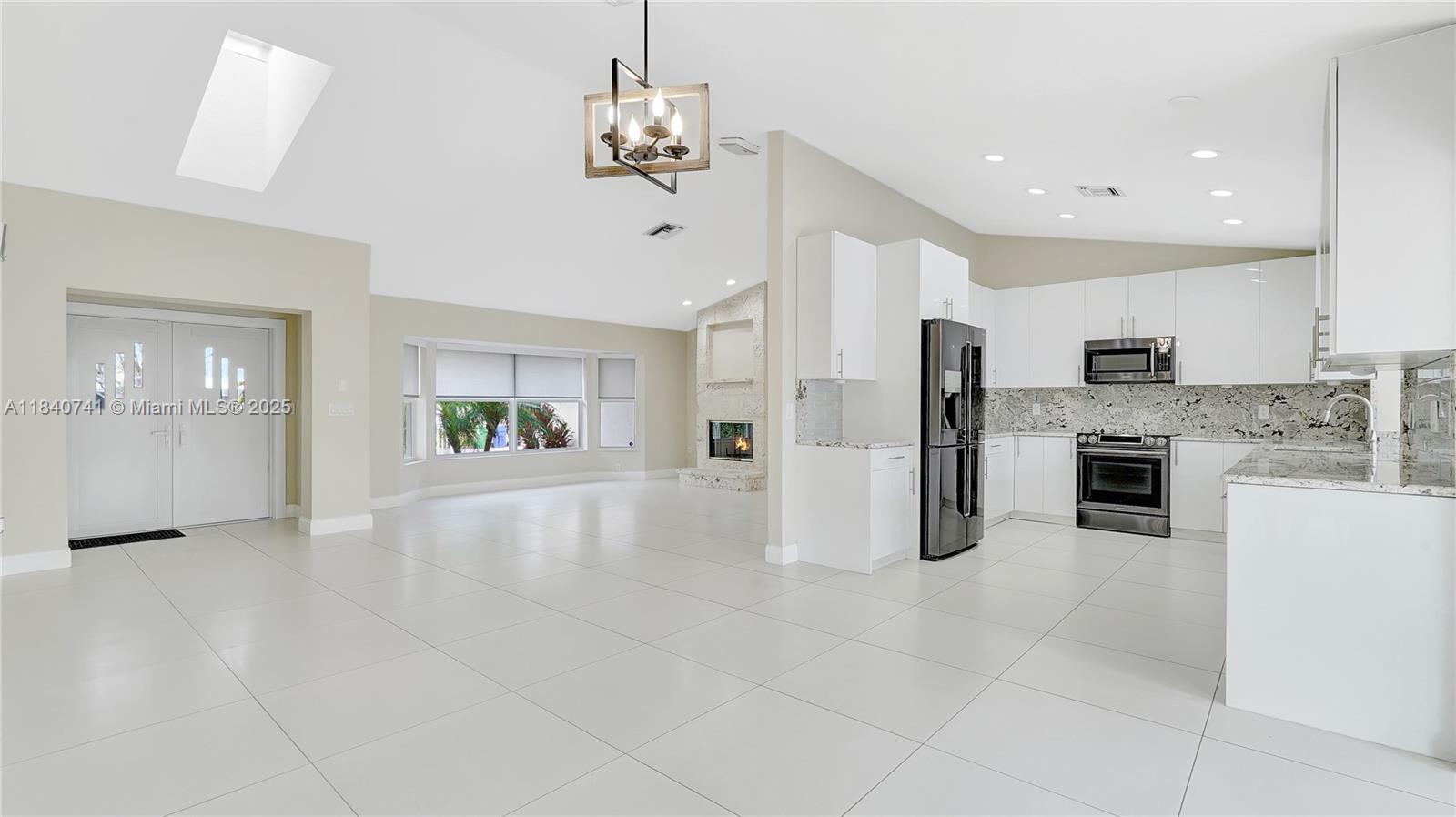 Welcome to your dream rental in the heart of Fort Lauderdale! This fully renovated 3-bedroom, 2-bath single-family home is located in the highly desirable Coral Ridge Isles neighborhood—just minutes from the beach, top-rated restaurants, shopping, and entertainment. Step inside to discover a bright, open-concept layout with sleek porcelain tile flooring, abundant natural light, and a gorgeous modern kitchen. Enjoy true South Florida living in your own private backyard oasis. Recent upgrades include a new roof, impact windows and doors, and a state-of-the-art alarm system for your peace of mind. The private backyard oasis features a sparkling pool, lush tropical landscaping, and full fencing with a motorized gated entrance.