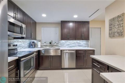 Photo of 3100 Riverside Dr #107, Coral Springs, FL 33065 (MLS # A11837879)