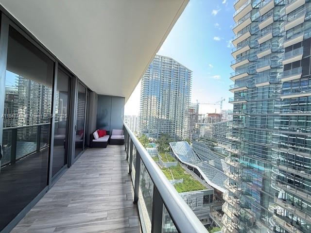 Experience elevated living at SLS Brickell in this luxurious and spacious 1-bedroom plus den, 2-bathroom residence. Thoughtfully designed with Smart Home technology, sleek Italian cabinetry, and elegant finishes throughout, this unit seamlessly blends modern style with everyday functionality. Floor-to-ceiling glass doors lead to an expansive balcony offering breathtaking views of Brickell City Centre. Residents enjoy access to world-class amenities, including two pools (one on the 9th floor and a rooftop sky pool), a state-of-the-art fitness center equipped with cutting-edge exercise machines and technology, a full-service spa, tennis and basketball courts, a rock climbing wall, billiards lounge, social room and more.