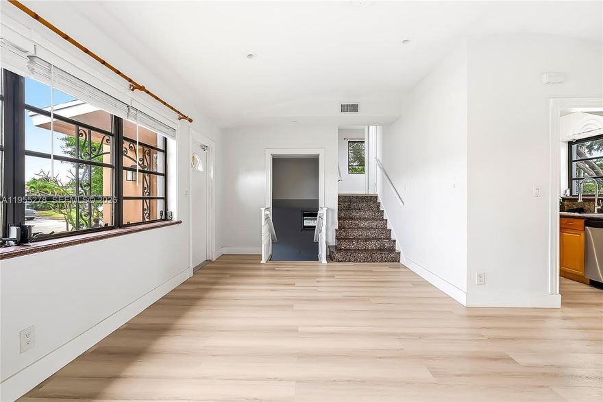 Lovely remodeled 4 bedroom, 3 bath, single family home with views of the lake.  No HOA.  Watch the boats go by from this home that is located only one block from Lake Osborne. Upstairs family room, kitchen, bedroom and outside patio have views of the gorgeous lake.  Upgraded kitchen with granite counter tops.  Newer vinyl flooring and granite flooring. Main level has living room, dining room, kitchen, family room and master bedroom; up a few granite stairs, main bath with two more bedrooms. Downstairs could be large family room or 4th bedroom with full bathroom with its own front entrance. Also, great for entertaining with built in bar.  Enormous Fenced Yard.  Patio built with all high-quality composite decking.  Beautiful home, will go quick