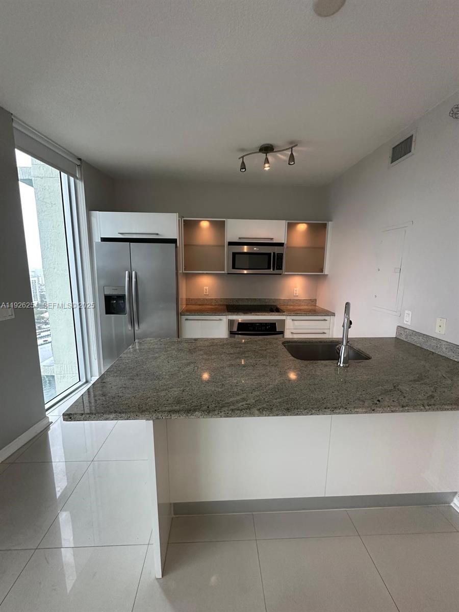 LATITUDE ON THE RIVER CON - Residential Lease