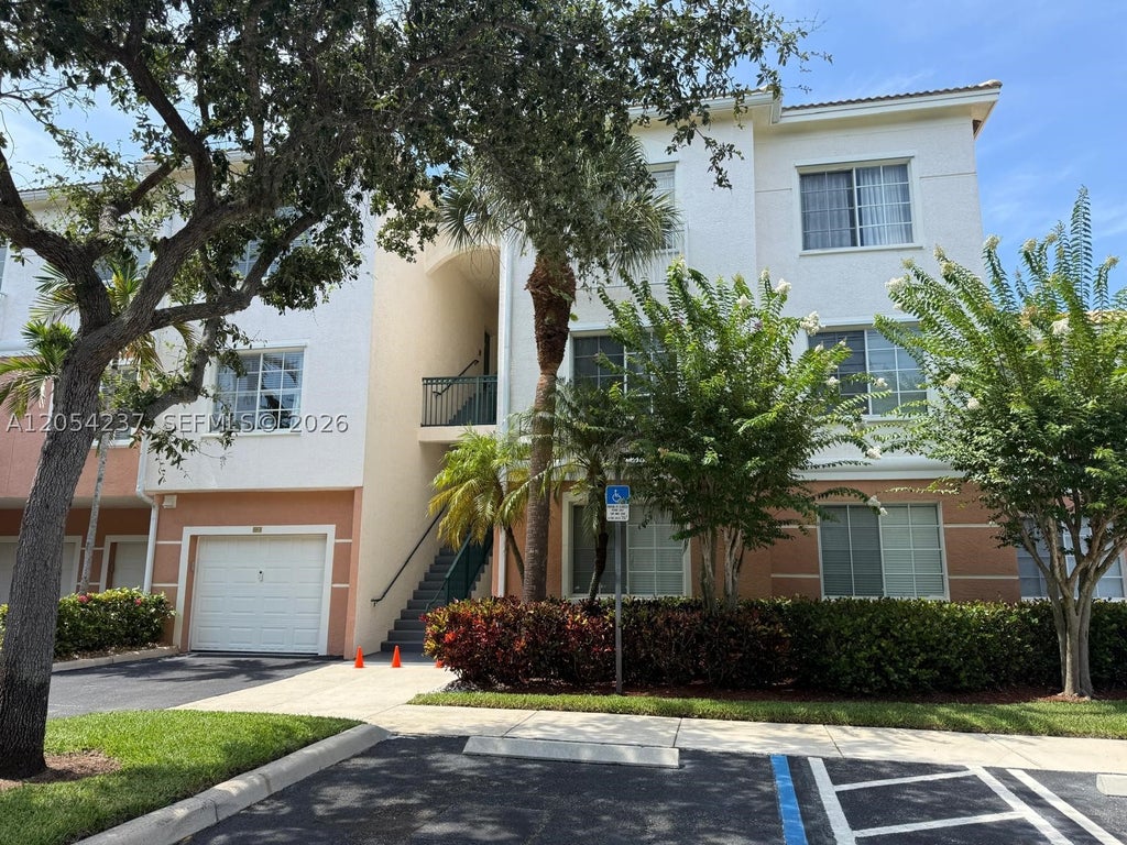 Photo of 9208 W Myrtlewood Cir W #208, Palm Beach Gardens, FL 33418 (MLS # A12054237)
