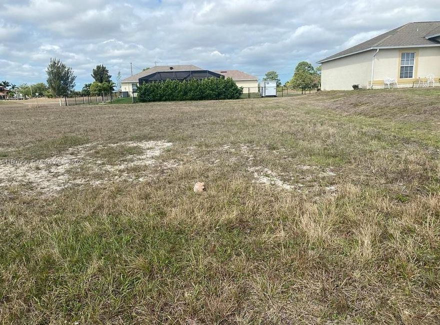 Price Improved ! Beautiful clean and READY-TO-BUILD LOT located in one of the FASTEST-GROWING AREAS of Cape Coral. Nestled in a quiet community with NO HOA, this property is PRICED TO SELL QUICKLY. Centrally positioned near El Dorado Blvd. and the booming Pine Island Corridor, just minutes from Coral Oaks GOLF COURSE, local parks and dog parks, and the beautiful Cape Coral waterways. Close to TOP-RATED SCHOOLS, this lot is perfect for your DREAM HOME or as a SMART INVESTMENT.