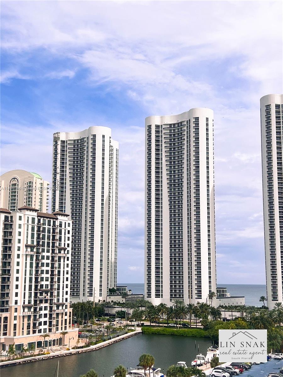A corner high floor with a vast balcony and beautiful views of the canal, city, and ocean. Spacious living room. Just across the street from the beach. Excellent location in Sunny Isles in front of the Ritz Carlton. There are great amenities in this full-service building. Walking distance to the coast, the best restaurants, banks, retail stores, etc. Near main highways, hospitals, and airports. Class A K-8 grade school. Internet, cable, water, and trash included. Cover parking assignment, plenty of guest spaces. A storage room. Gym, conference room, sauna, fantastic swimming pool, tennis courtyard. Bike garage. Security gate. Convenience store. Suttle available. The building has already passed 50 years of maintenance. Looks new and fresh. For showing, call or text the listing agent, EASY.