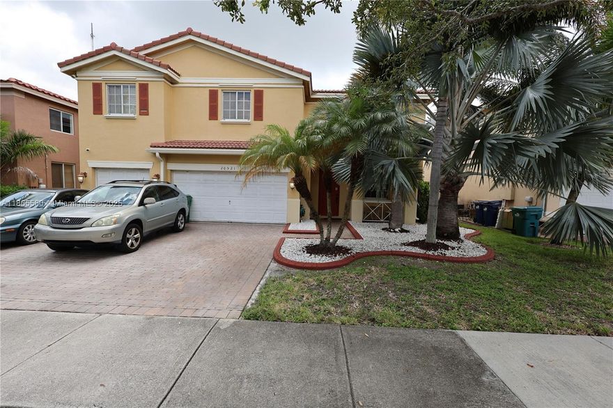 Welcome to your new home in Coconut Cay, a gated community in Miami Gardens. Stunning 5-bedroom, 4-bathroom residence offers an exceptional lay out and elegant finishes. This home features a gourmet kitchen, a formal living room, specious dining and family room, as well as a casual eat-in kitchen area perfect for both entertaining and every day living. Upstairs you will find a generous master suite, while the first floor includes a junior master suite for guest or multi-generational living. Additional highlights include a 3-car garage and a dual A/C units, providing flexibility. Located just 15 minutes from Aventura Mall and the iconic Hard Rock Hotel, this home offers a perfect balance of luxury and location.