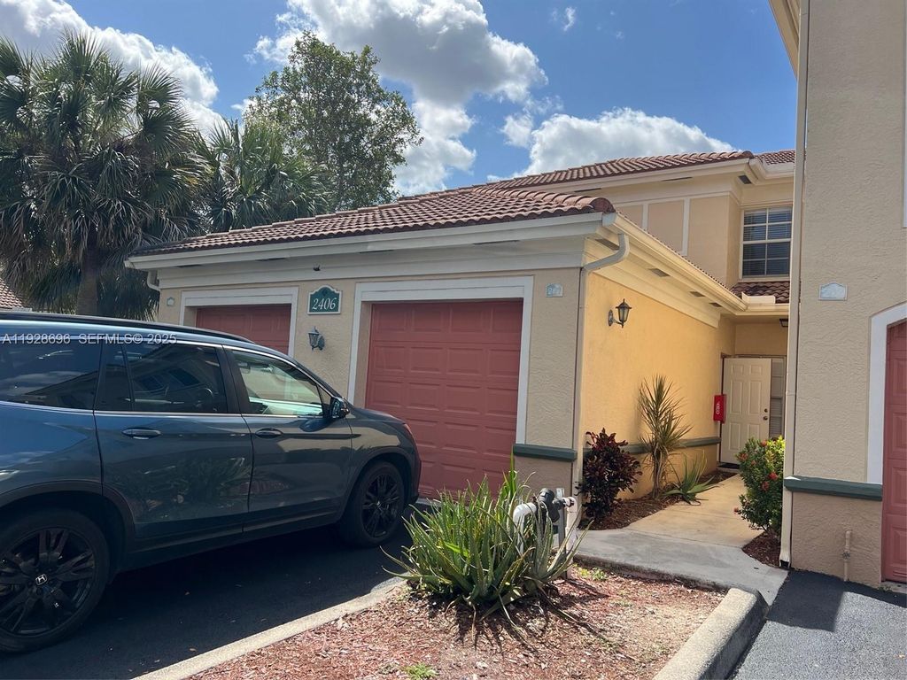 Photo of 2406 Centergate Dr #201, Miramar, FL 33025 (MLS # A11928696)