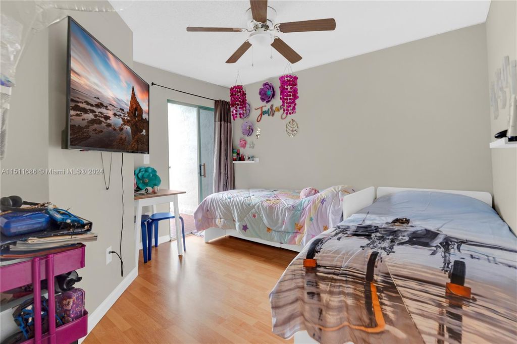 Photo of 1365 NW 126th Way #1365, Sunrise, FL 33323 (MLS # A11511686)