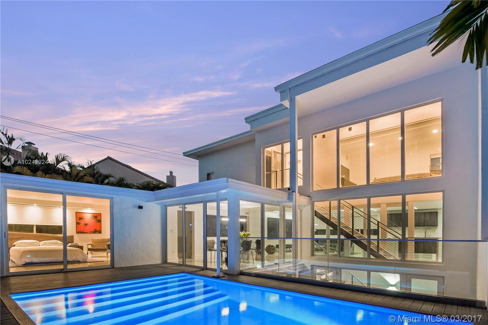 Comfortable modern design meets Coconut Grove charm in The Cube. Completed March 2017. Residence surrounded by lush landscaping creating a private, cozy setting. Entertain guests around the pool deck w/ summer kitchen while seamlessly flowing into living and dining areas. Secluded Master bedroom with rain shower, walk-in closet & expansive views of the pool through walls of glass. Ground level guest suite w/ kitchen & full bath. Turn key & easy to maintain. Walkable to parks & entertainment in the Grove.