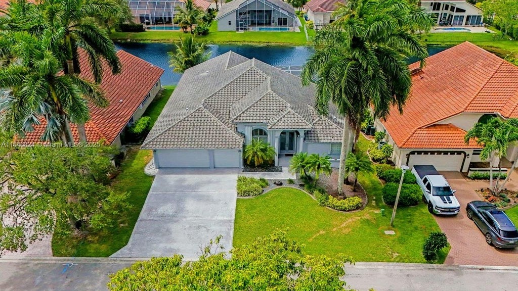 Photo of 9912 NW 49th Pl, Coral Springs, FL 33076 (MLS # A11846824)