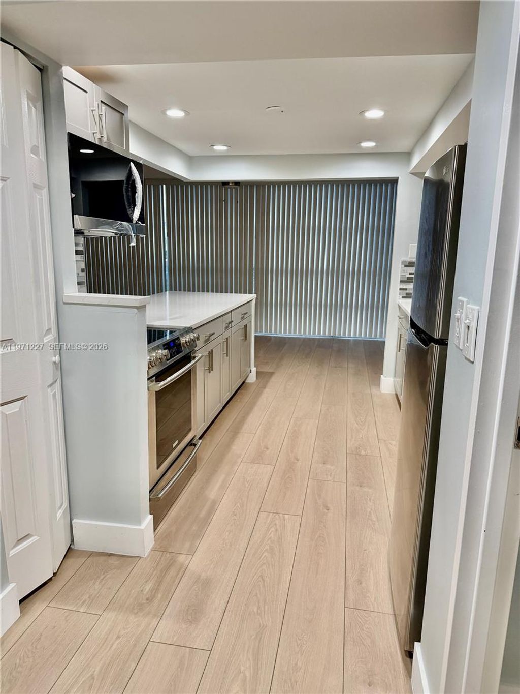 Photo of 601 Three Islands Blvd #217, Hallandale Beach, FL 33009 (MLS # A11971227)