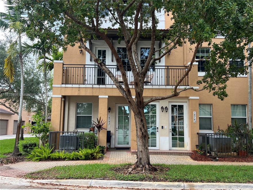 Investor Opportunity! Beautiful corner unit with 2 bedrooms and 2 bathrooms in the desirable gated community of Cobblestone in West Pembroke Pines. This well-maintained unit offers an open kitchen with granite countertops and in-unit washer and dryer. Assigned resident parking plus guest spaces. Enjoy resort-style amenities: clubhouse, fitness center, pool, and children's play area. HOA fee includes gym, alarm monitoring, pool, 24/7 security, roof maintenance, insurance, Xfinity cable, and Wi-Fi. Perfect for investors — property is rented, offering immediate rental income.