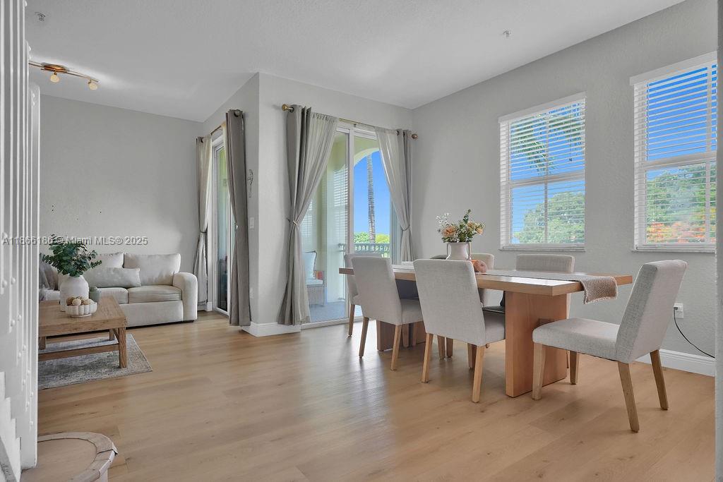 Welcome to this bright and spacious 3 Bedroom, 2.5 Bath Townhome with over 1,400 sq. ft., perfectly designed for a young Family. Set within the private Golf course community of Fontainebleau, this Home features soaring ceilings, a large Kitchen with plenty Storage, and a private open Balcony. Enjoy the comfort of two assigned Parking spaces plus ample guest parking, and bring your Furry Friends—Pets up to 60 lbs. are welcome! Community offers walking Trails, a Clubhouse, and a sparkling Pool, making it easy to unwind. Minutes from Miami International Airport, Florida International University, Dolphin Mall, Doral, top restaurants, and major highways (Dolphin & Turnpike). Here is a great home for a family-friendly home with great amenities or an investment property in a high-demand area.