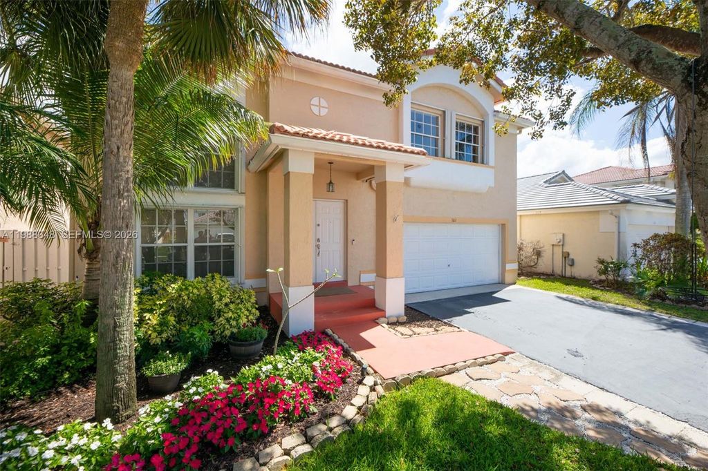 Photo of 161 W Granada Ave, Weston, FL 33326 (MLS # A11988348)