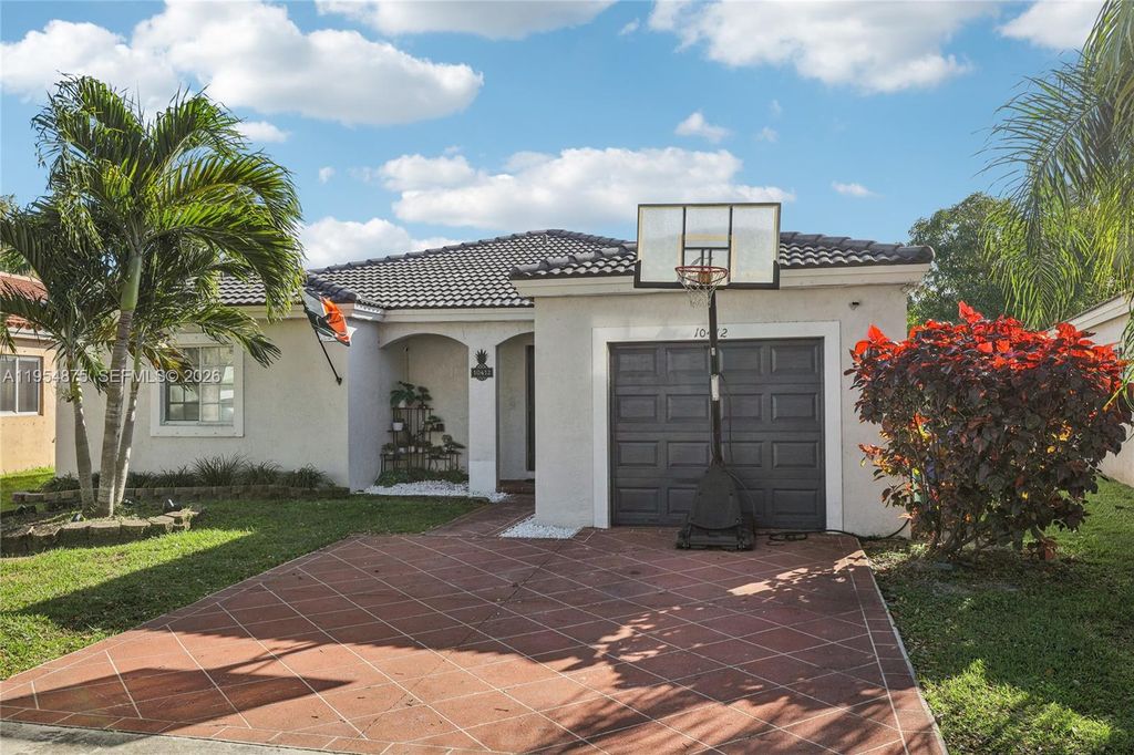 Photo of 10412 SW 23rd Ct, Miramar, FL 33025 (MLS # A11954875)