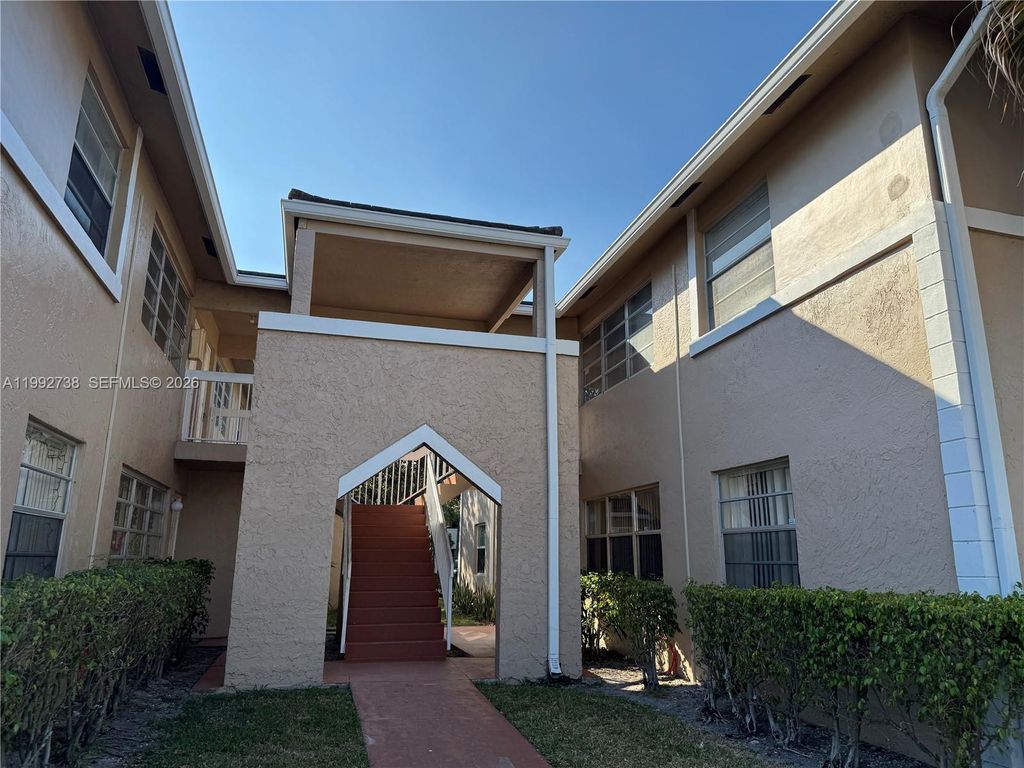 Photo of 1024 Twin Lakes Dr #21-F, Coral Springs, FL 33071 (MLS # A11992738)