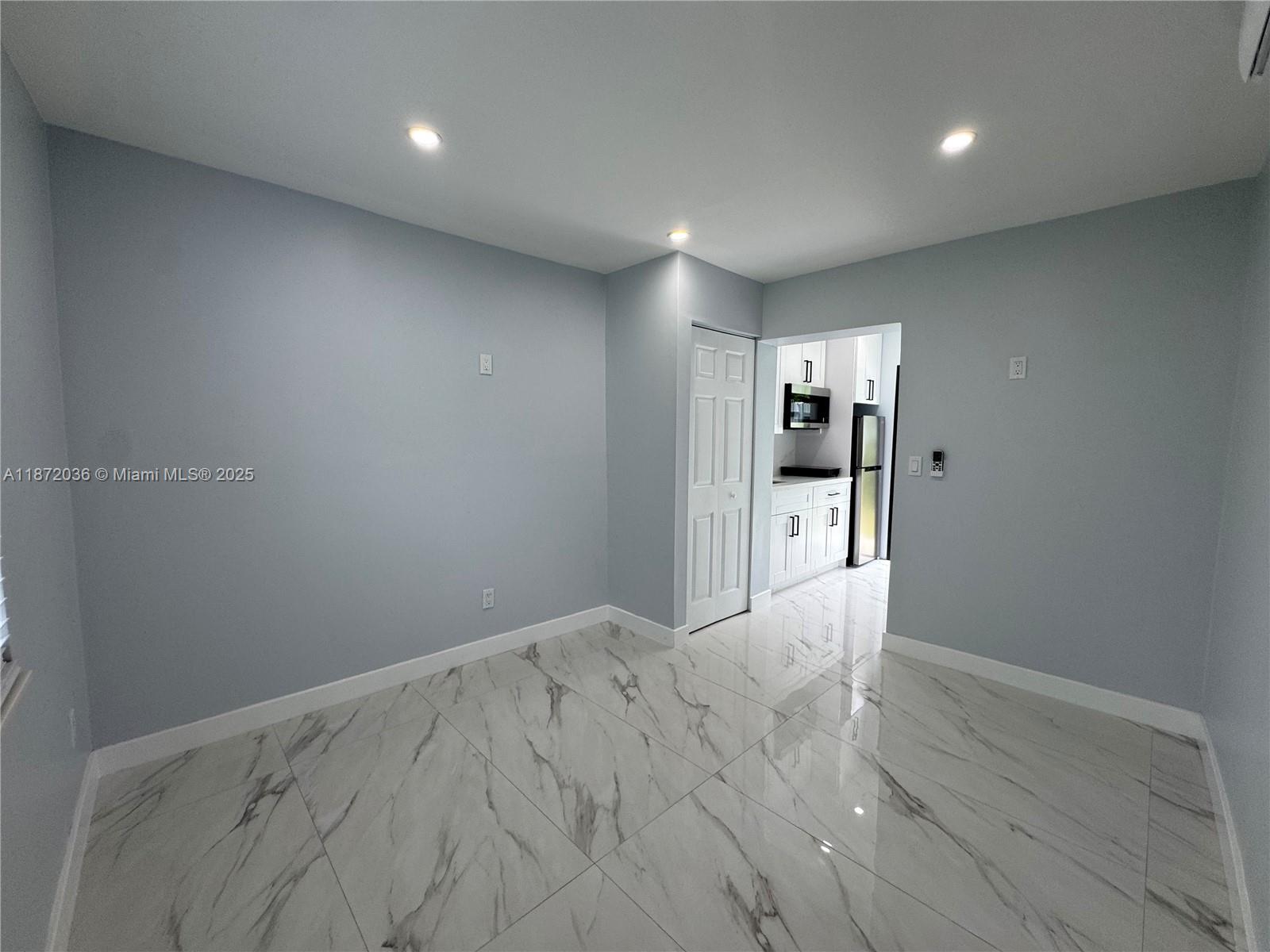 Remodeled efficiency in North Miami Beach! This bright and modern space features a full-size refrigerator, stovetop, and microwave for convenience. Freshly updated with sleek finishes, new flooring, and plenty of natural light. Perfect for anyone seeking comfort, functionality, and an ideal location close to shopping, dining, schools, and major highways. Move-in ready with an easy application process and fast approval.