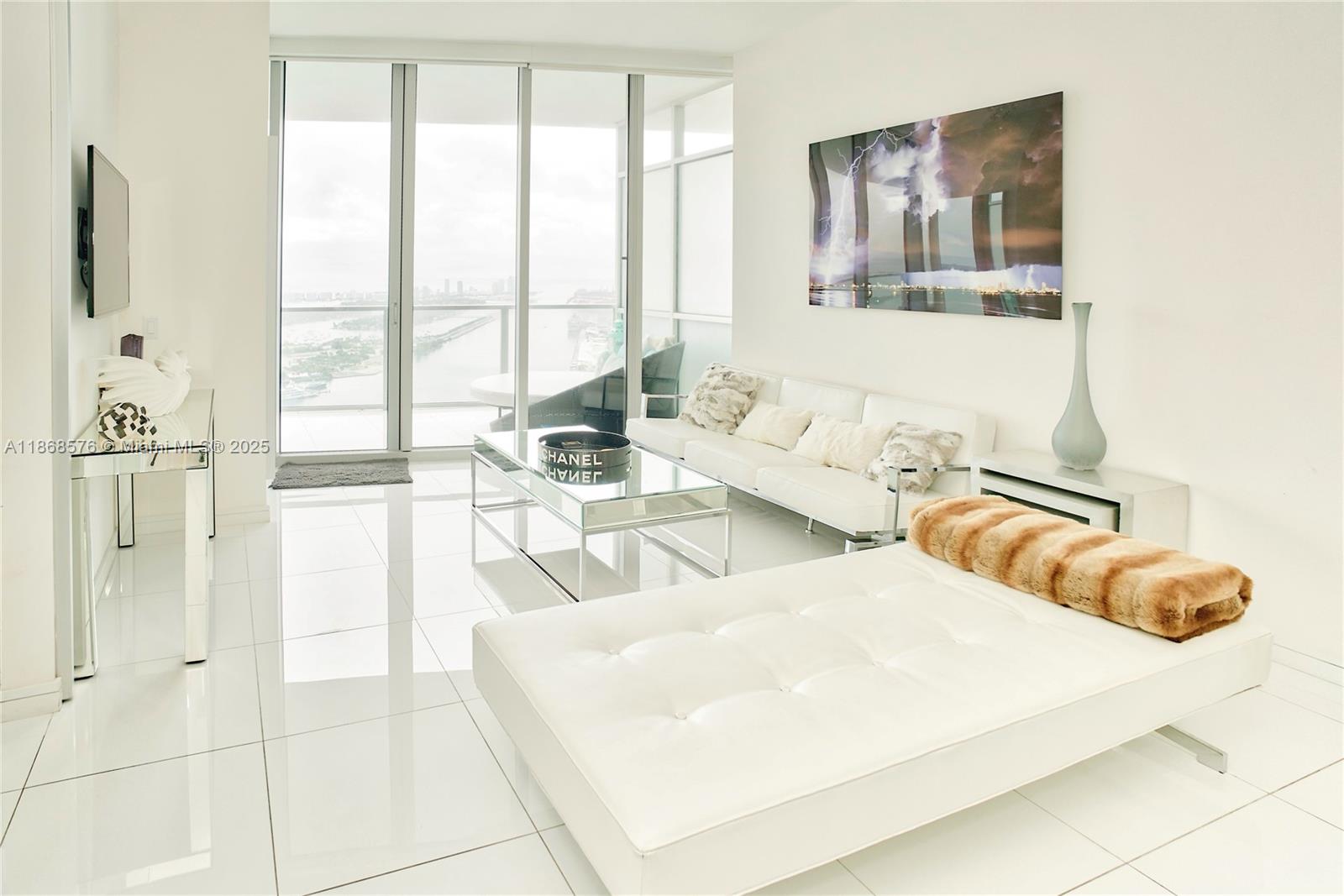 Experience breathtaking views of the iconic Miami skyline and the Intracoastal Waterway from the expansive glass balcony of this stunning 2-bedroom, 2.5-bath residence. This sophisticated unit features a private elevator and foyer, soaring ceilings and top-of-the-line kitchen appliances for a truly luxurious living experience. The prestigious Marquis Residences offers residents world-class amenities: fitness center, full-service spa, pool, private cabanas, concierge service, valet parking, and on-site restaurant. Ideally situated within walking distance to Bayside Marketplace, Kaseya Center, Pérez Art Museum, and the Adrienne Arsht Center, and just minutes from Wynwood, Midtown, Design District, Downtown Miami, Brickell, and South Beach. Available October 15th, 2025. Sorry, no pets.